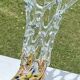 Plychrome openwork spun blown glass vase