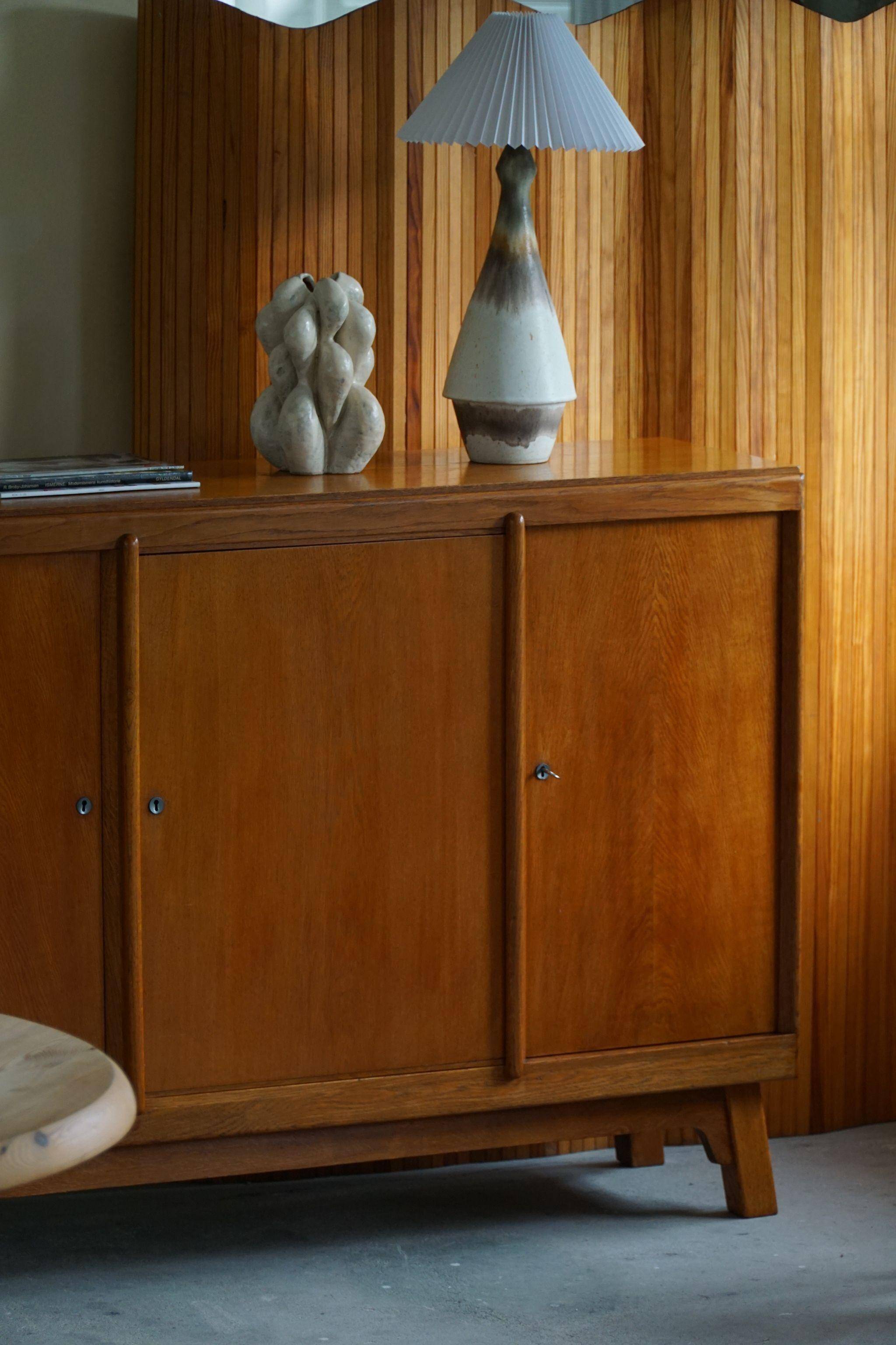 Mid-century buffet/enfilade in teak and oak, Danish cabinetmaker, 1960s