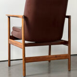 Fauteuil en cuir et bois de Ib Kofod Larsen