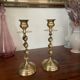 Pair of twisted brass candle holders