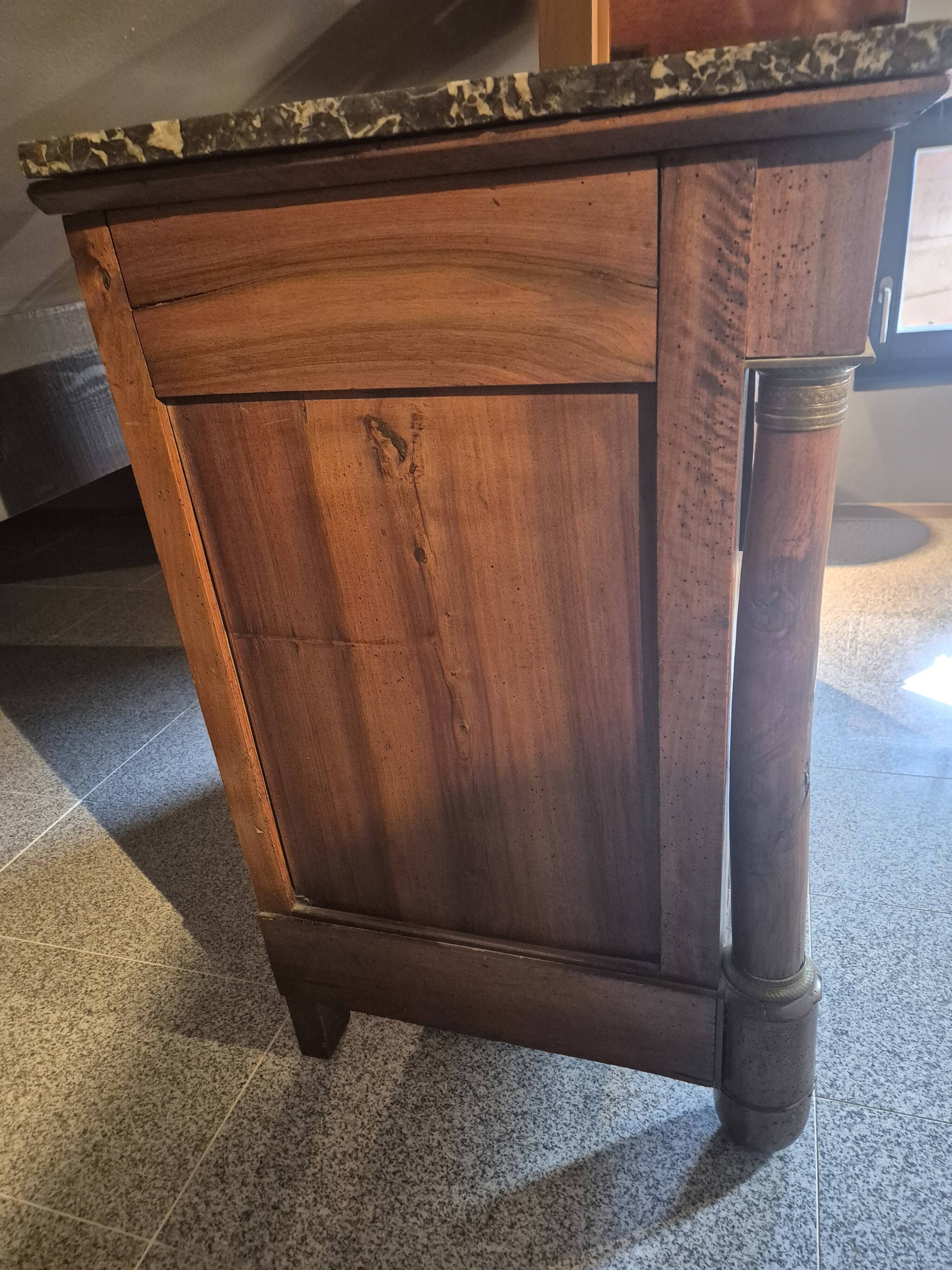 Empire period walnut chest of drawers