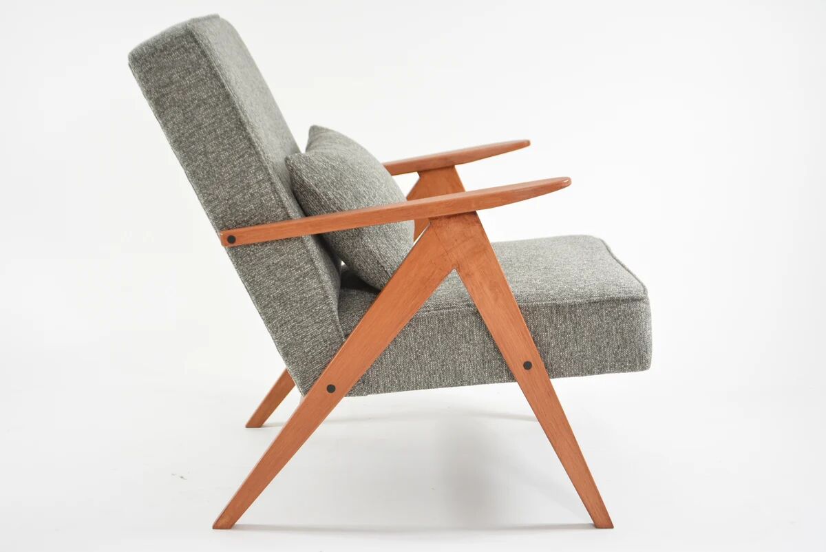 KOMPAS armchairs in grey and white.