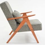 KOMPAS armchairs in grey and white.