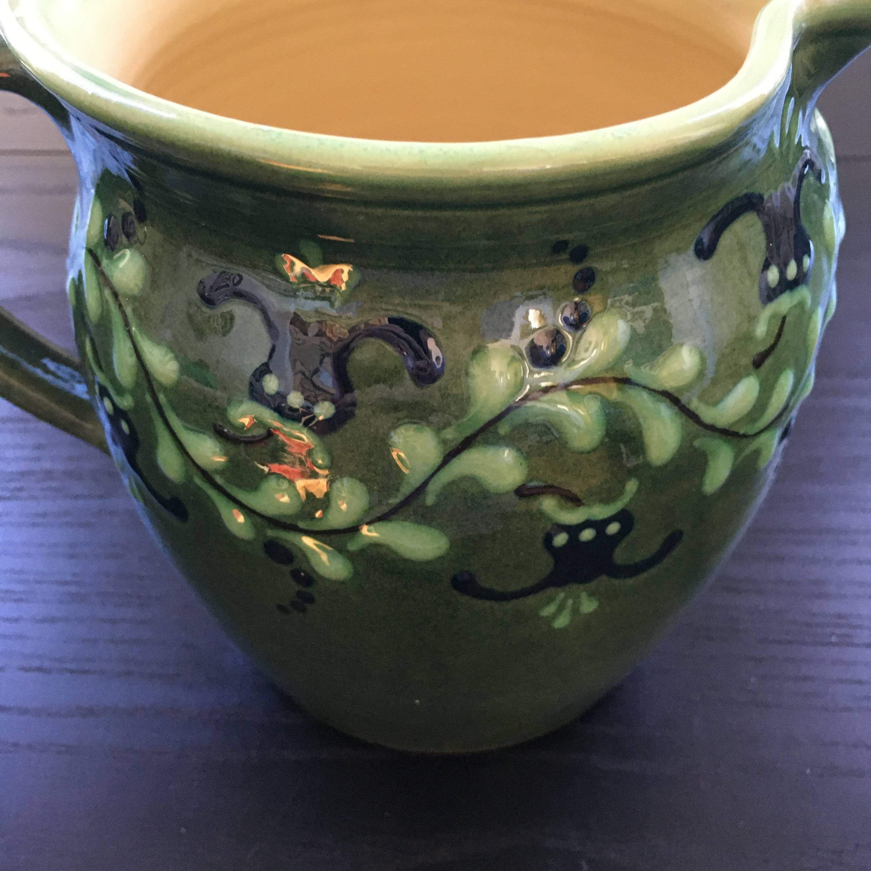 Large pitcher with floral decoration