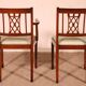 Set of 10 chairs and two mahogany armchairs in Hepplewhite style.