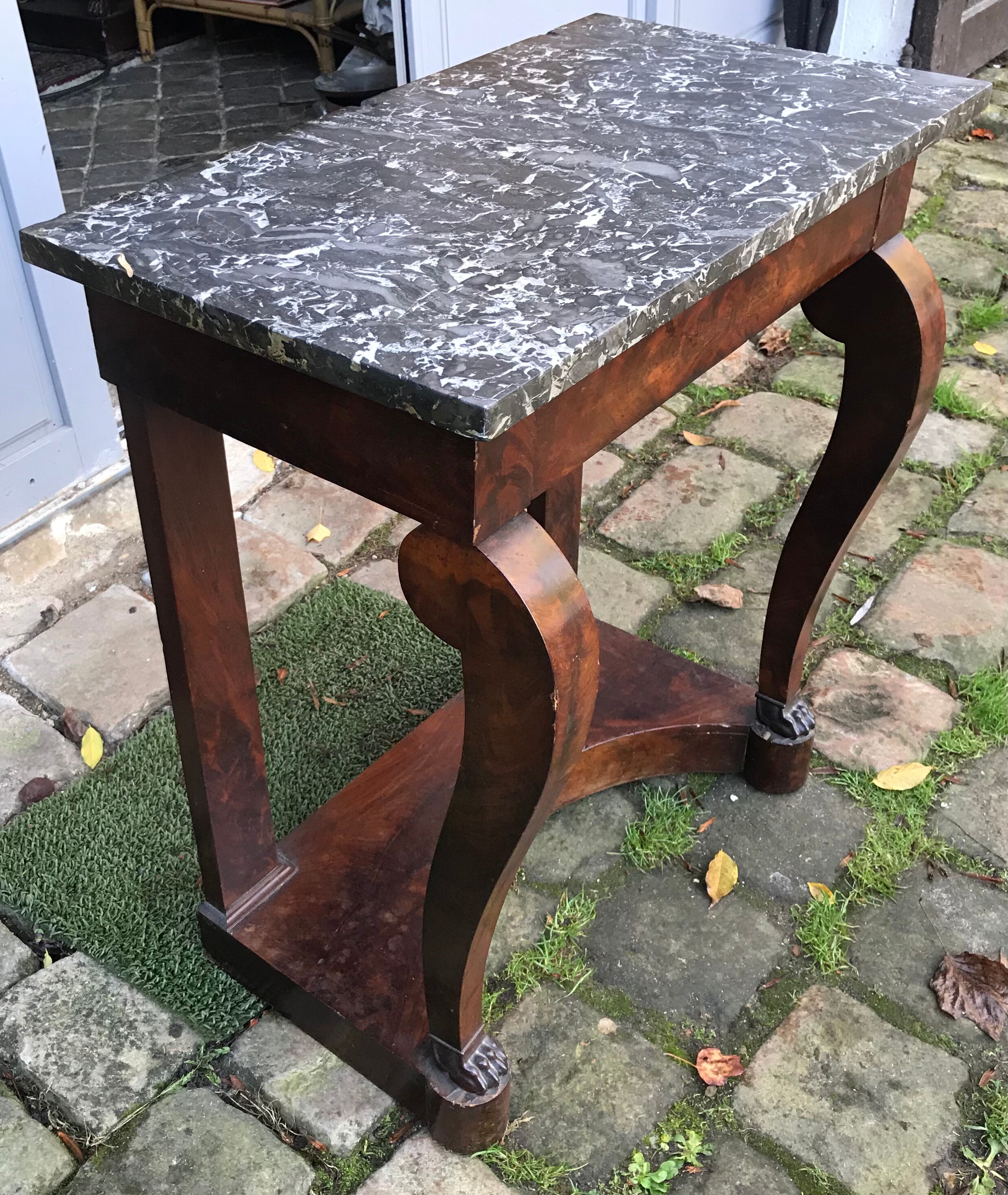 Empire-style console with marble and mahogany claws