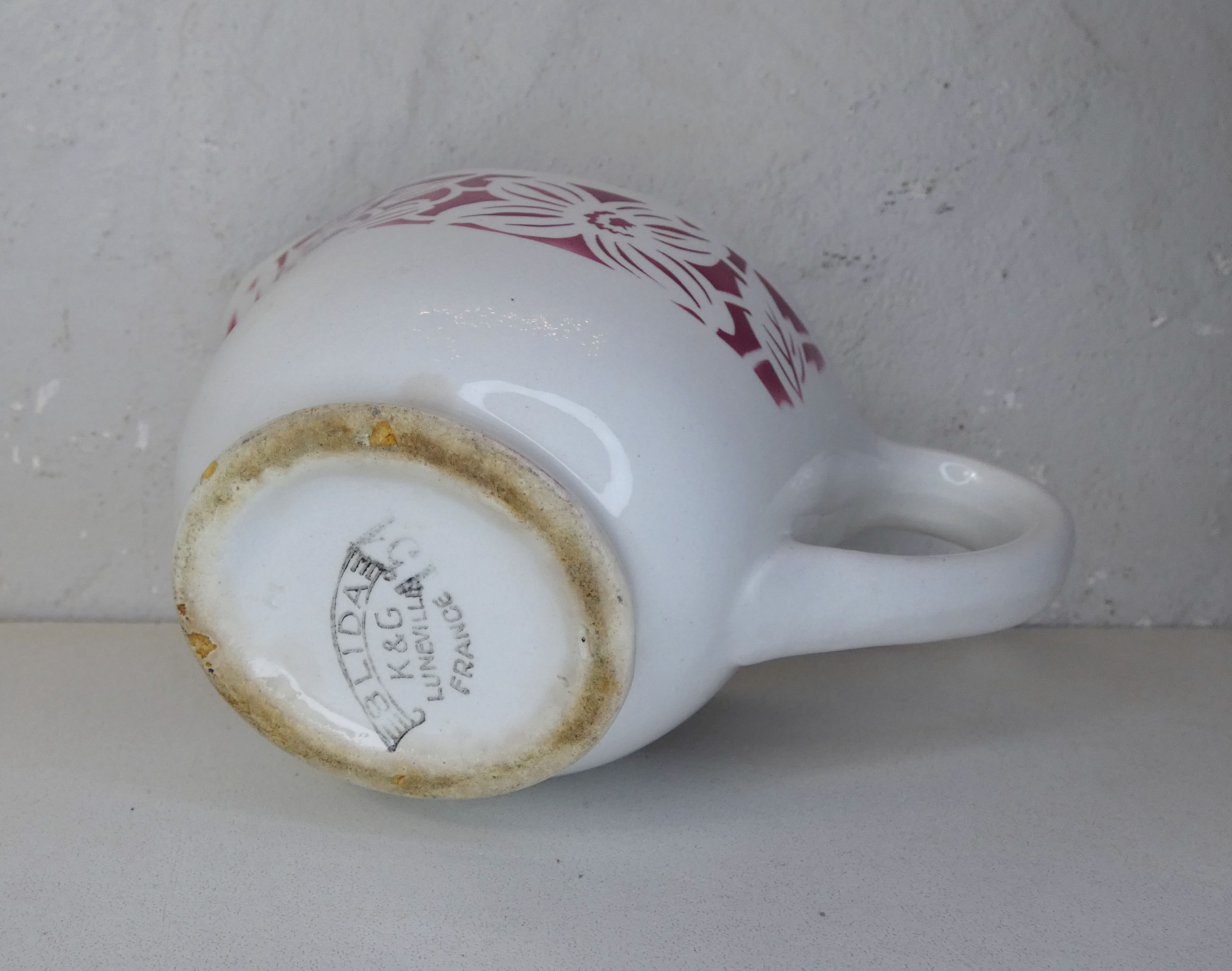 Old creamer milk pot in earthenware of Lunéville