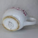 Old creamer milk pot in earthenware of Lunéville