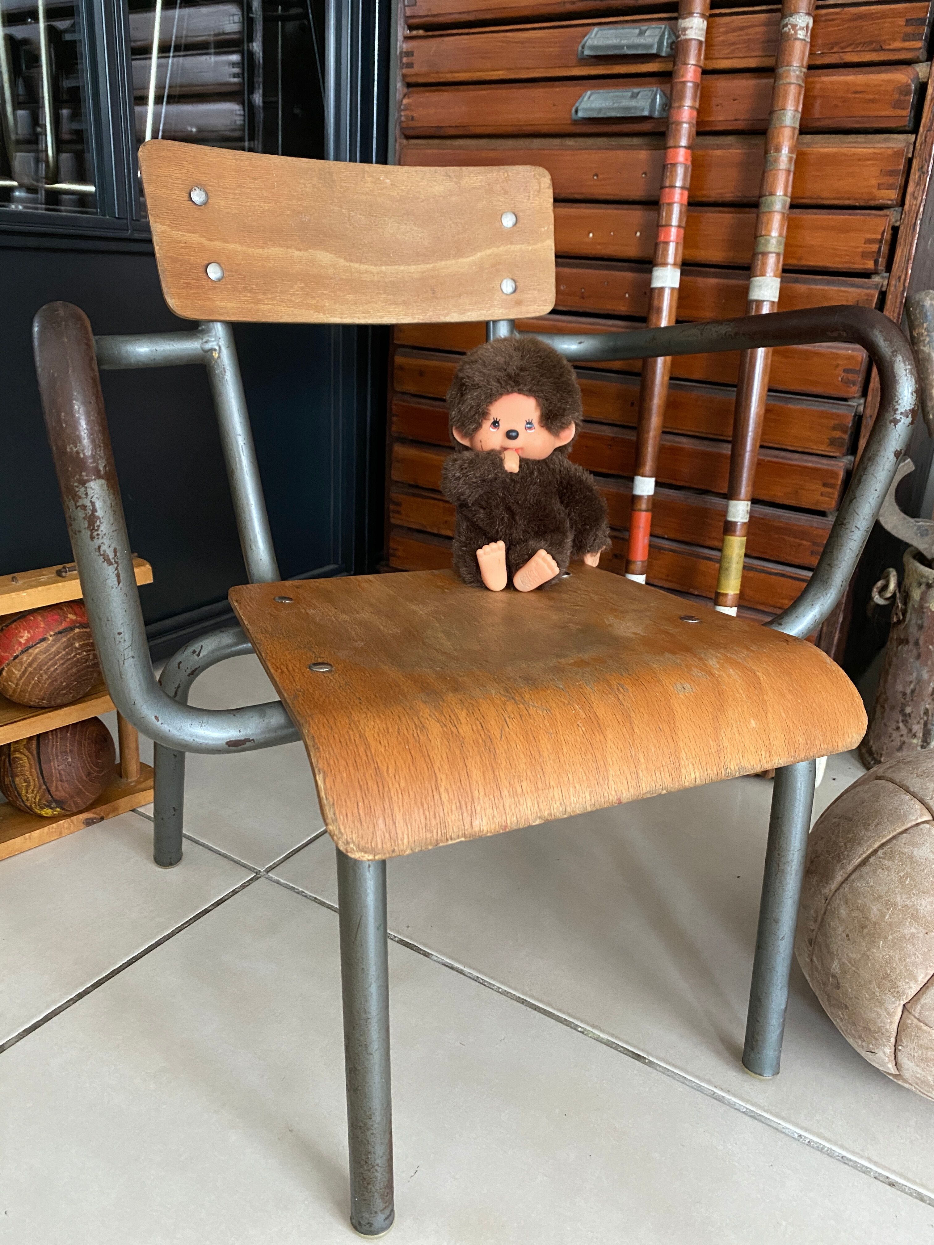 Old Mullca school chair with armrests