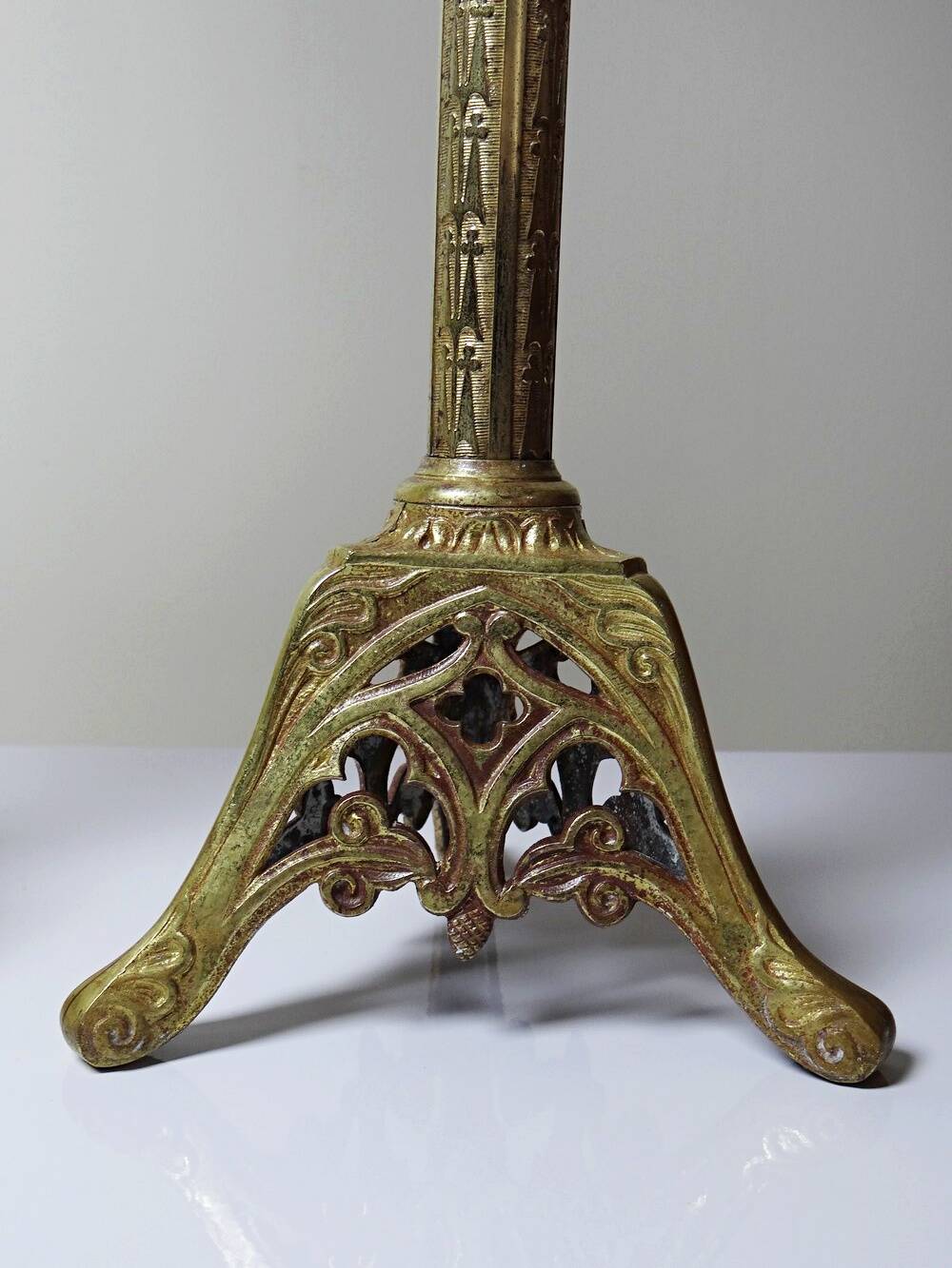 Large pair of antique gilded bronze candlesticks, Gothic style from the 19th century.
