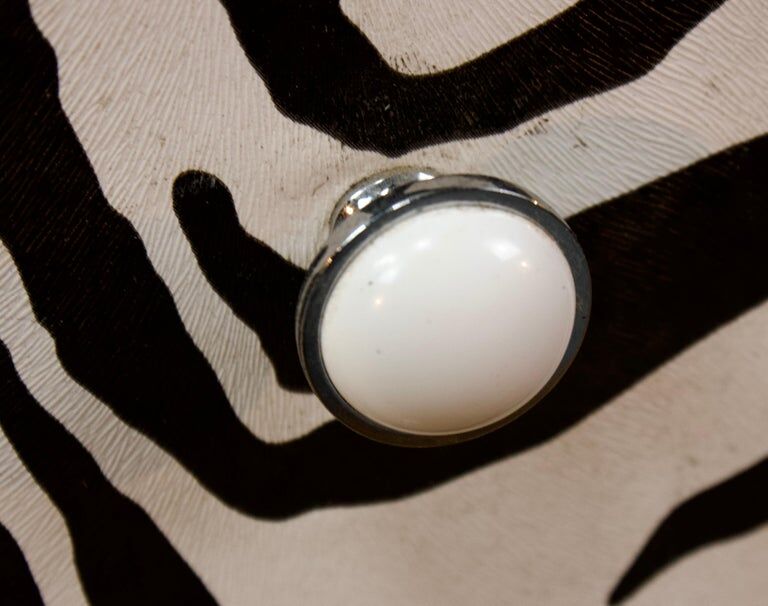 Restored chest of drawers with zebra tapestry 20th century