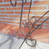 Wrought iron plant holders