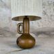 Vintage wooden table lamp with a wool shade.