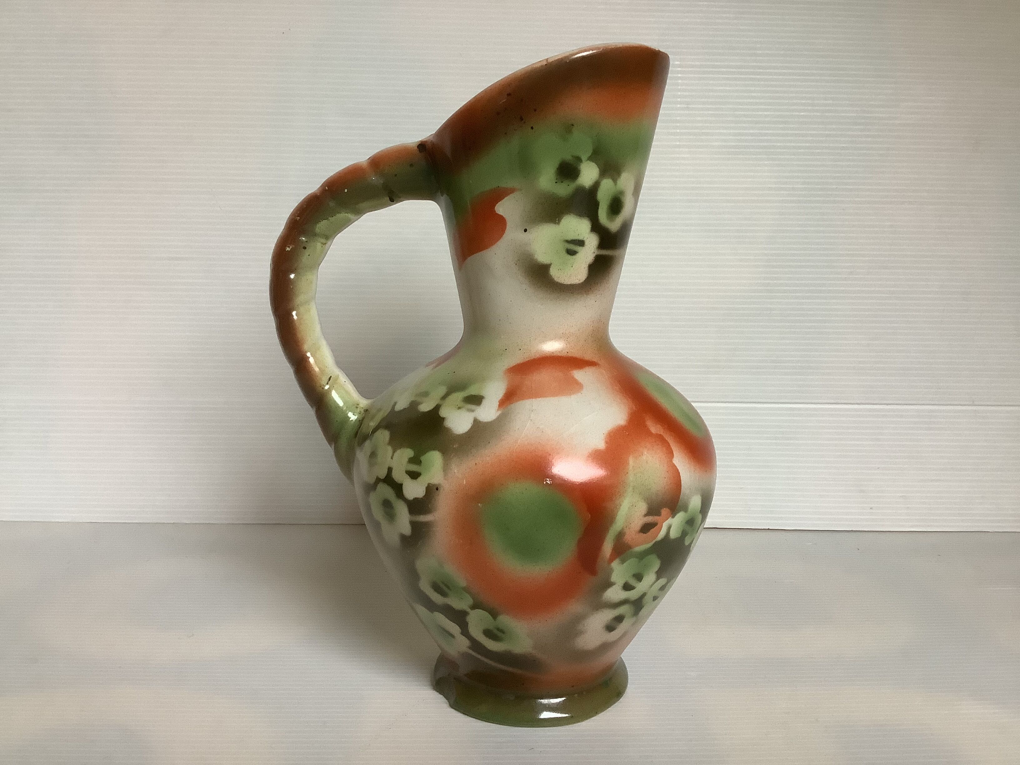 Old vase jug shape green and orange flowers