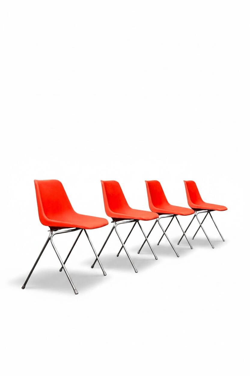 Set of 4 orange chairs designed by Robin Day for Hille.