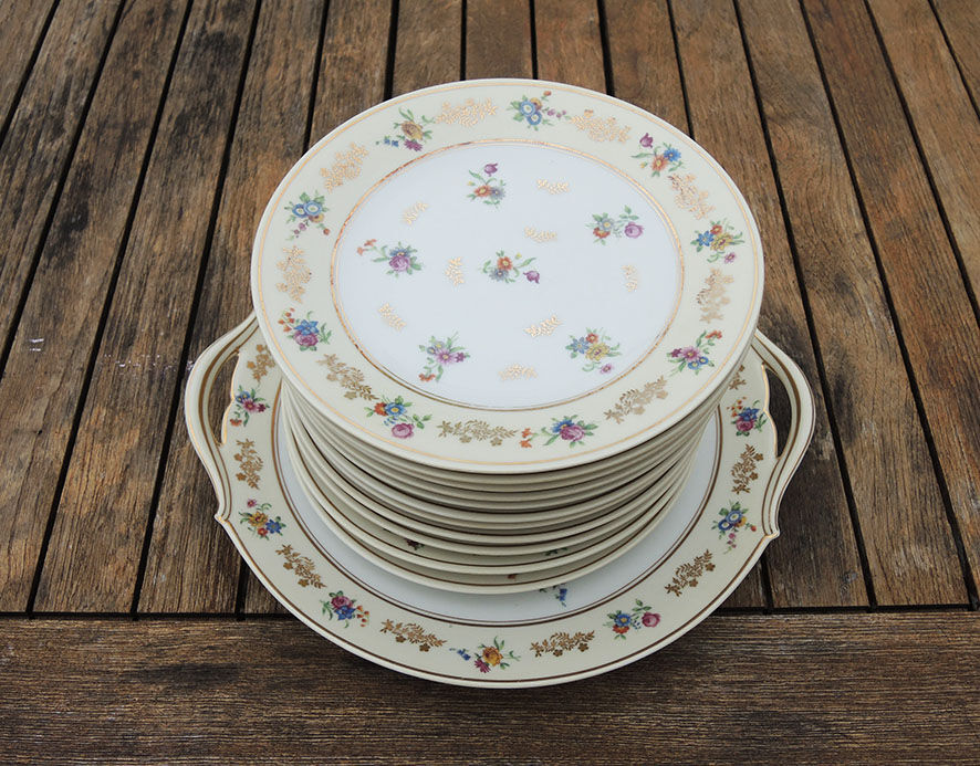 11 Limoges porcelain dessert plates, Raynaud & Co