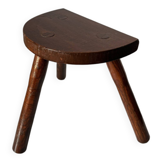 Varnished wooden stool with three legs