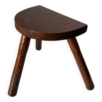 Tabouret en bois verni à trois pieds