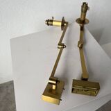 Pair of brass wall lights with articulated arms from the 70s