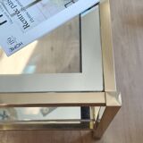Vintage coffee table with glass, mirror, and brass.