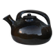 Glazed terracotta teapot