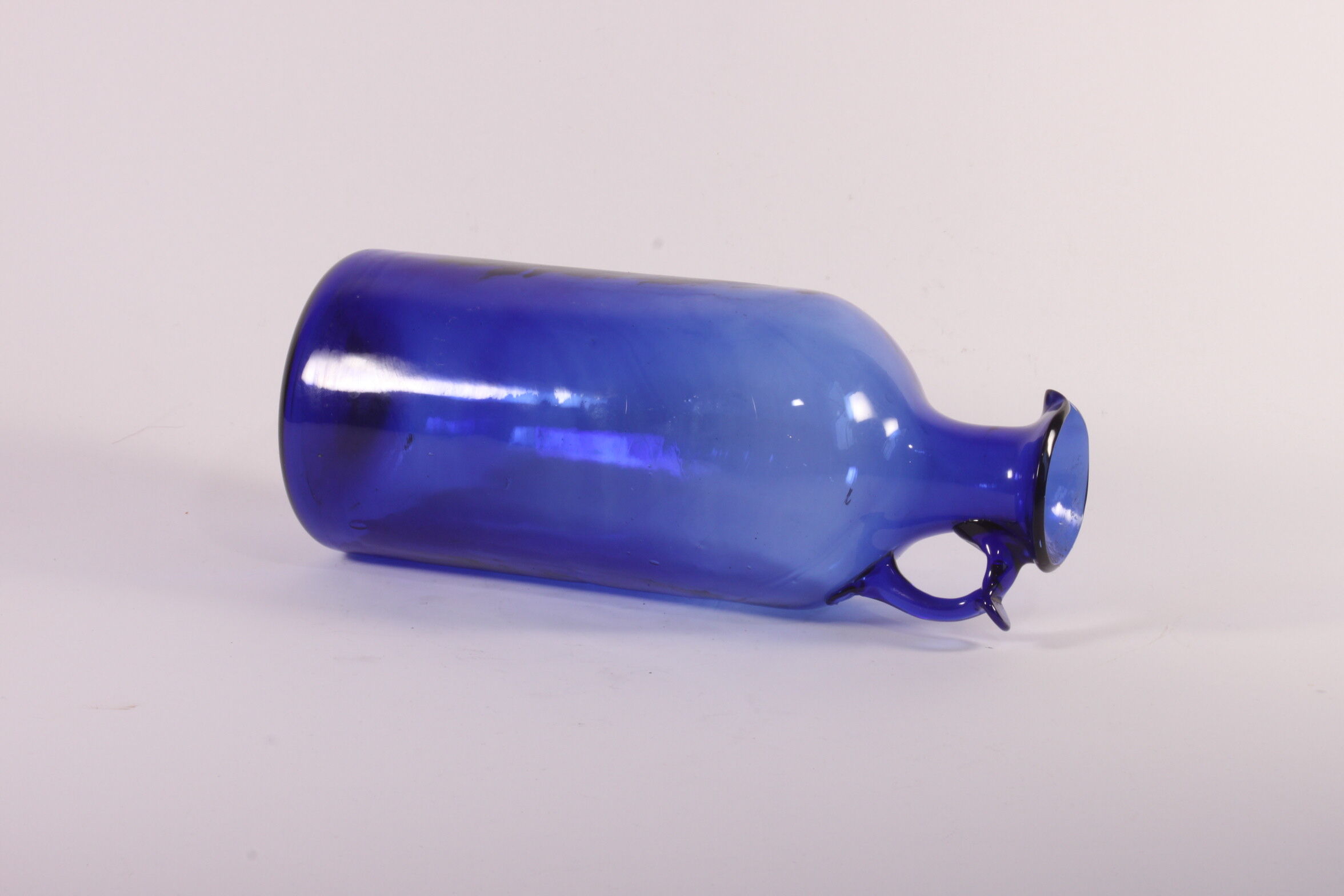 Antique handblown cobalt blue pitcher bottle, ca 1900.