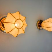 Pair of "cocoon" wall lights, resin and pine, Italy, 1970