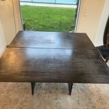 Brutalist design square table in steel