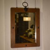 Brutalist mirror in solid oak with metal ring, 1960s.
