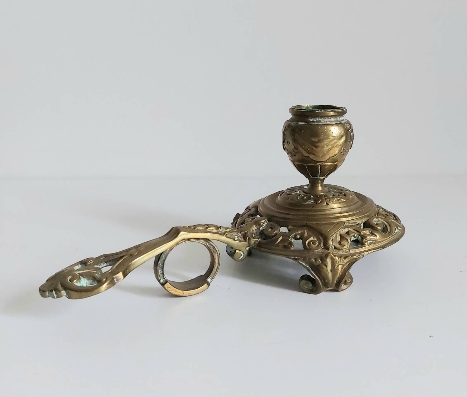 "Cave rat" brass candlestick