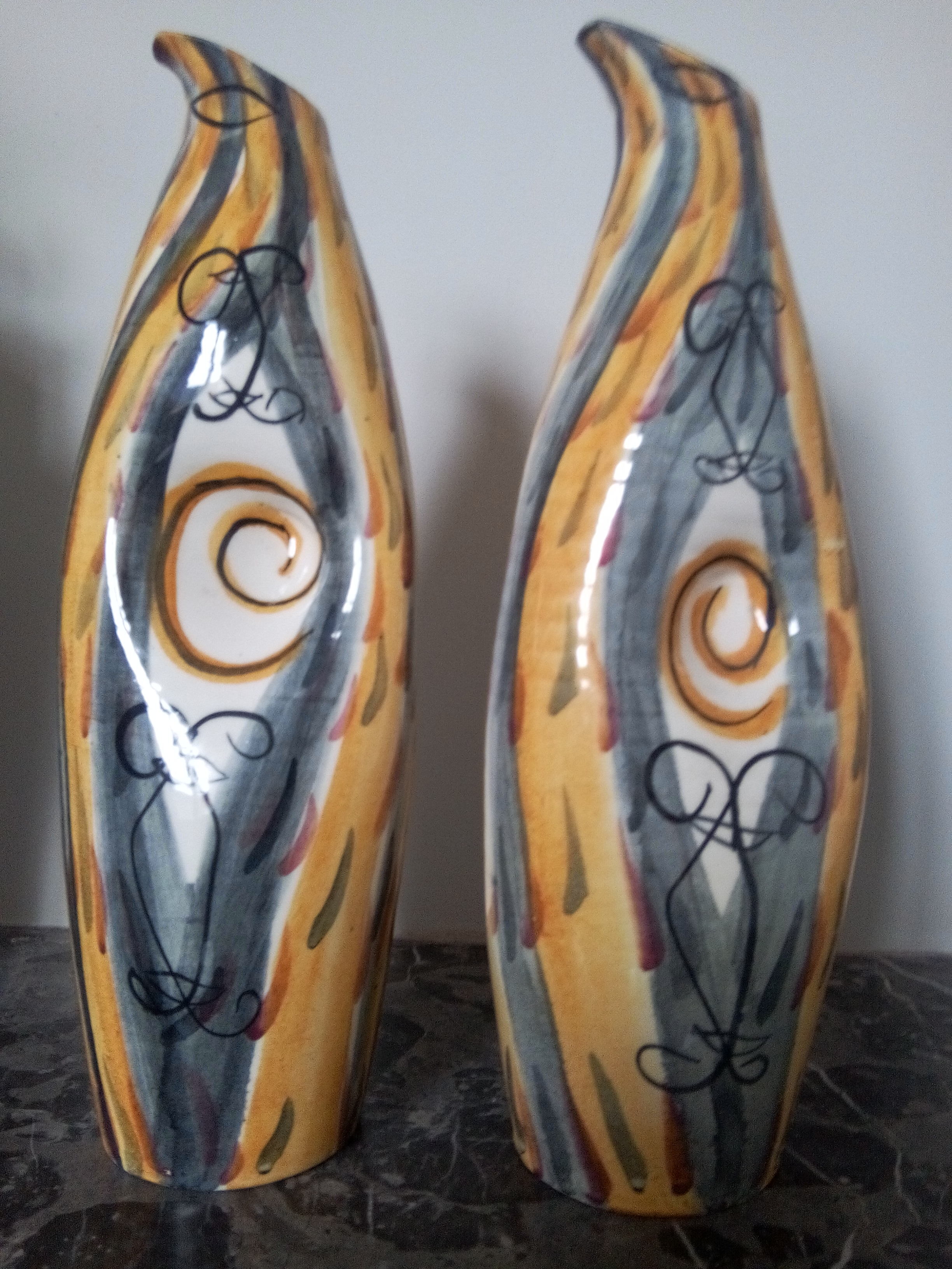 Pair of high pitchers with pinched belly Accolay ceramics