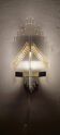 Methacrylate and metal wall lamp. Italy, 1980s.