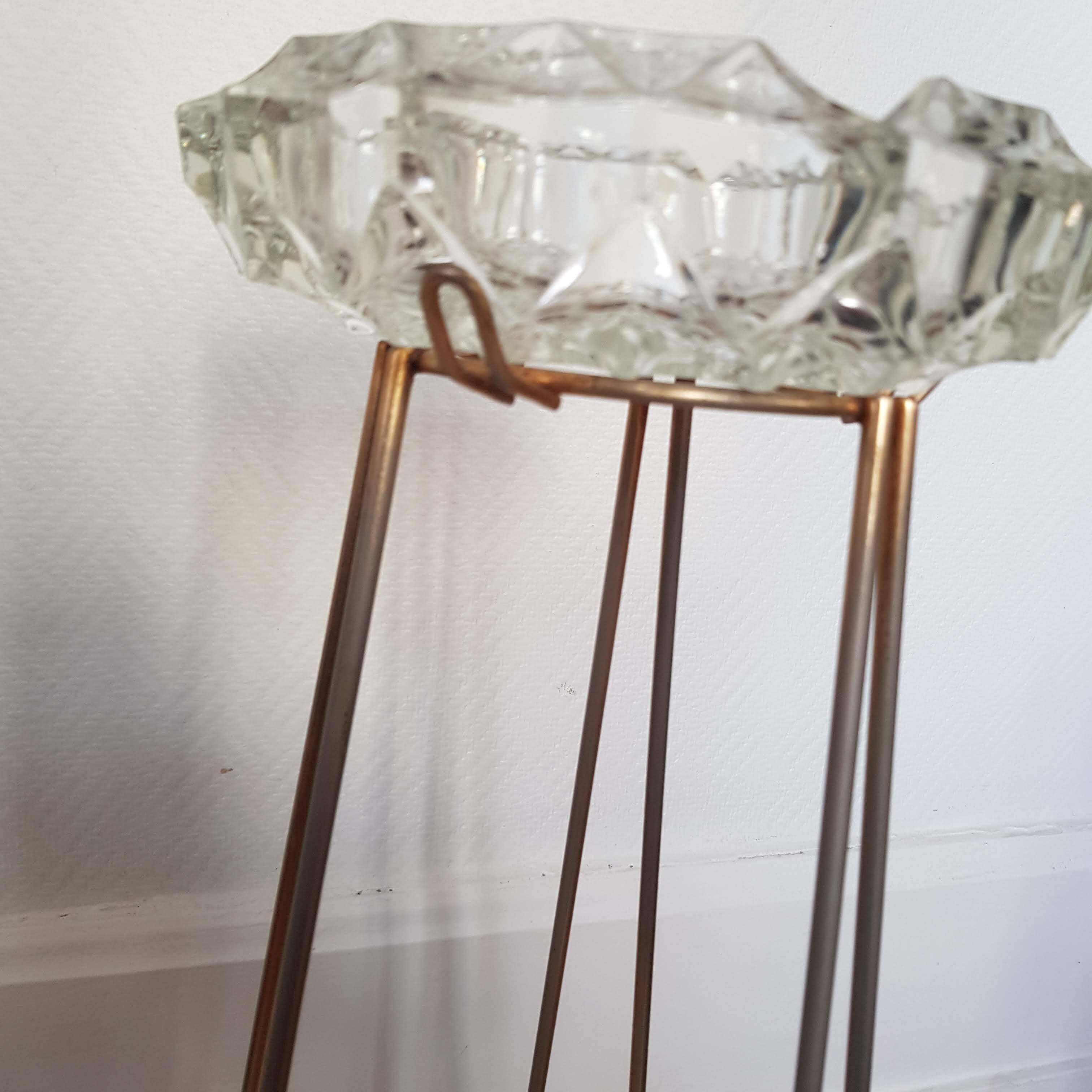 Crystal ashtray on brass tripod stand