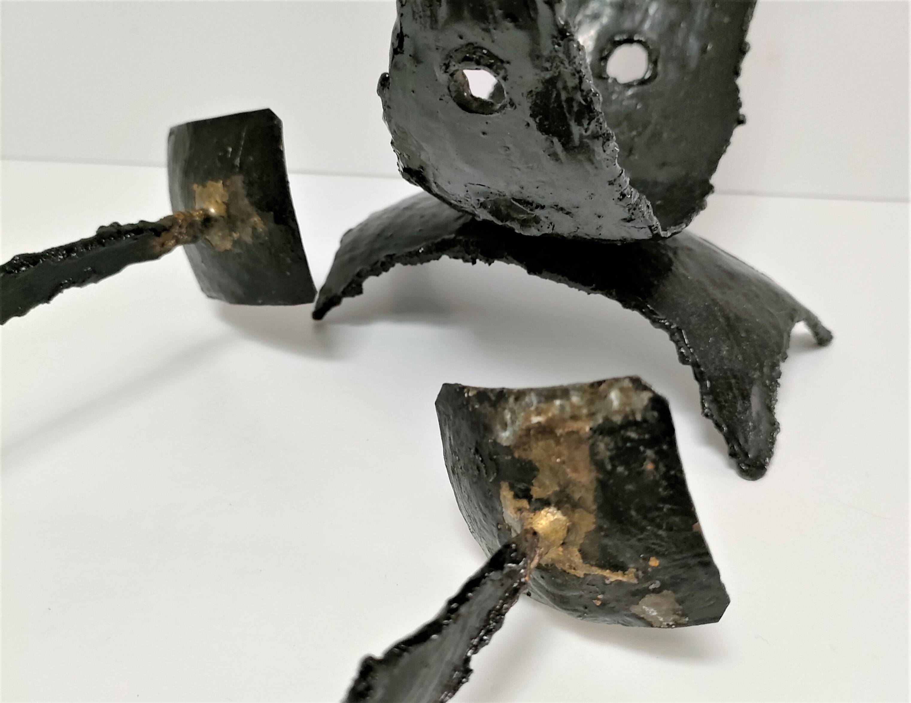 Pair of brutalist design metal candlesticks