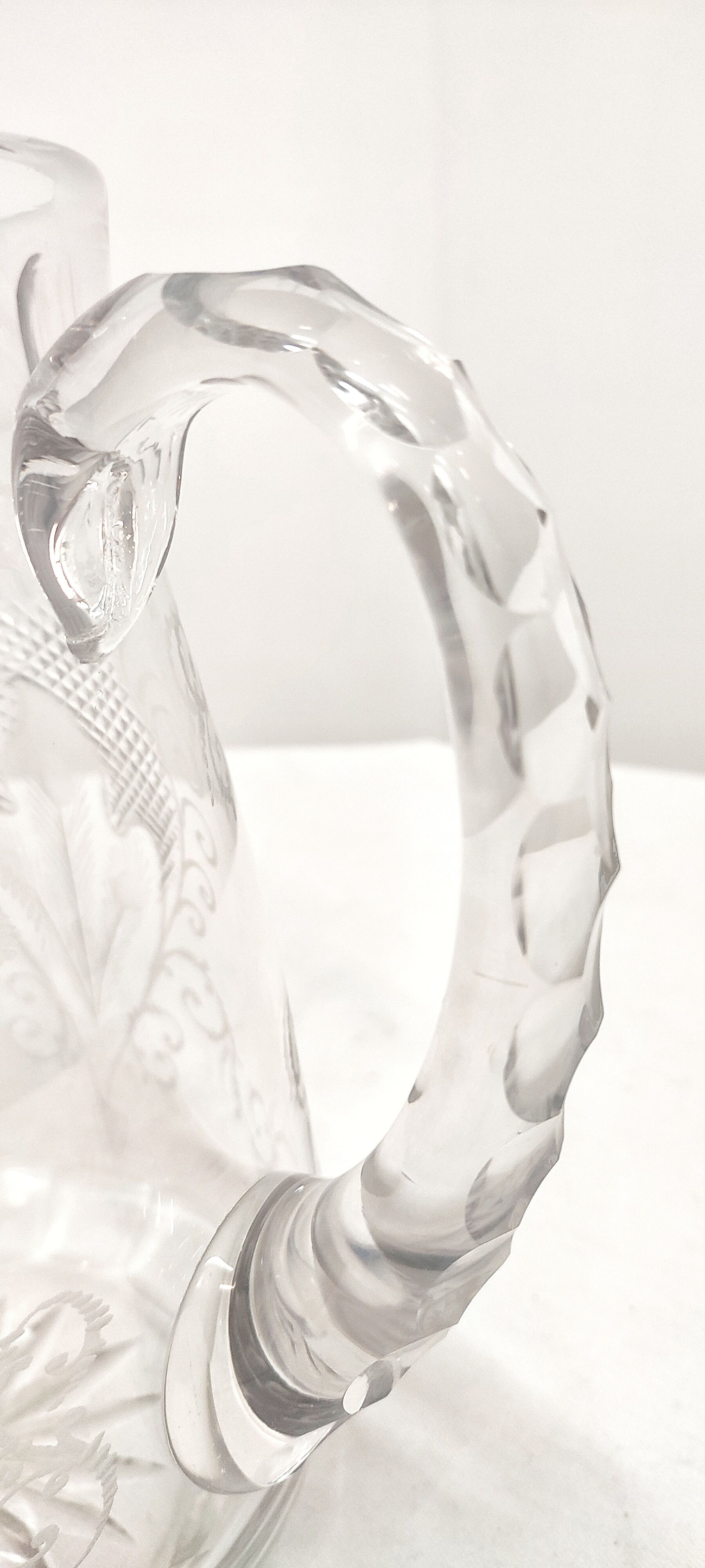 Hand-carved glass jug. France, 1950s.