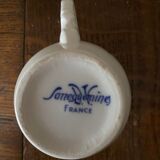 Tasse et soucoupe faïence Sarreguemines D.V. décor champêtre et fleurs bleues
