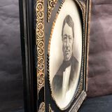 Black and gilded ebonite frame, wood and plaster 19th century