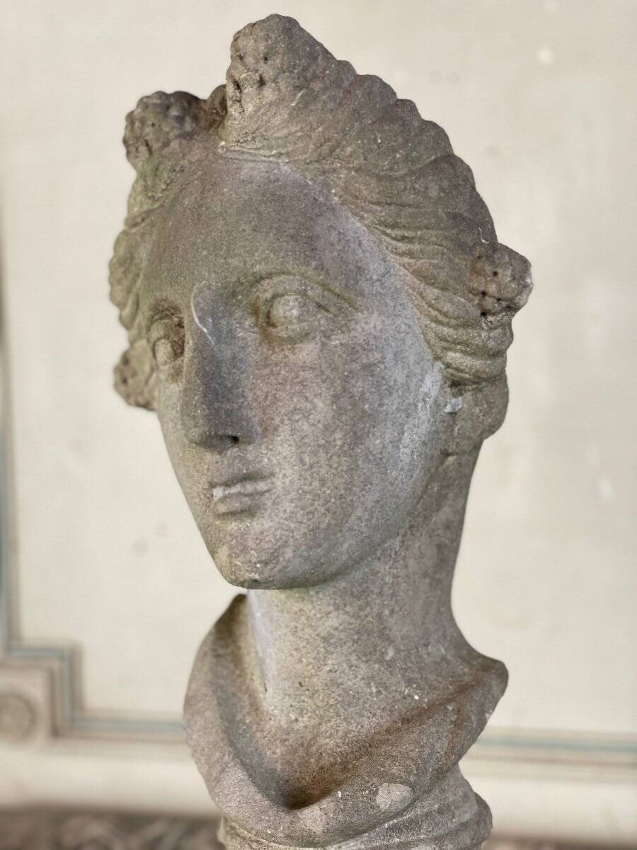 Female bust sculpted in stone
