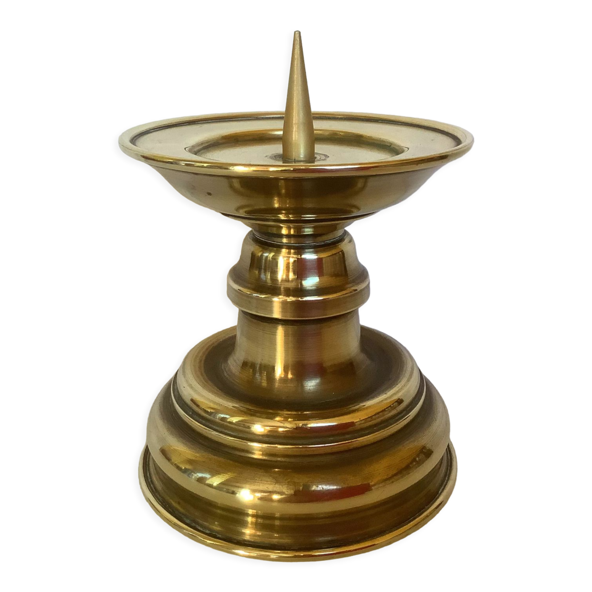 Old brass candle pique