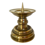 Old brass candle pique