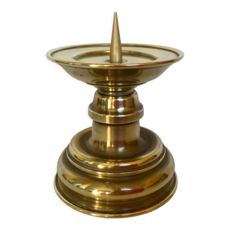 Old brass candle pique