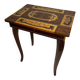 Small antique Italian inlaid table with Swiss music box.