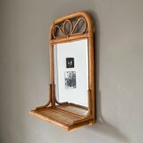 Arched rattan mirror with shelf. 1960.