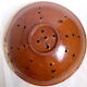 Yellow and green ceramic drain plate