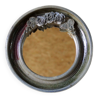 Round glazed ceramic mirror decorated with flowers