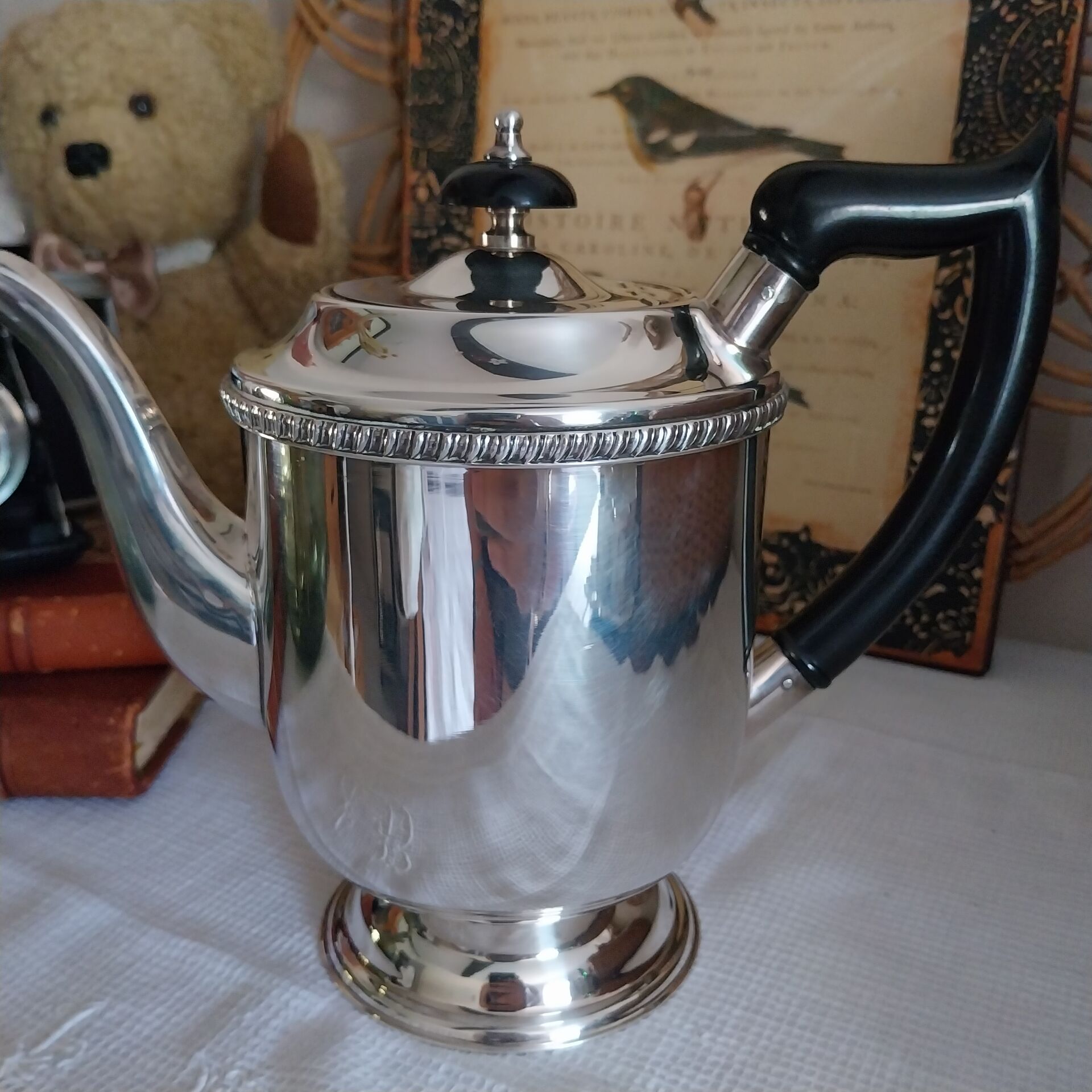 Old English coffee pot in silver-plated metal and Bakelite.
