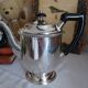 Old English coffee pot in silver-plated metal and Bakelite.