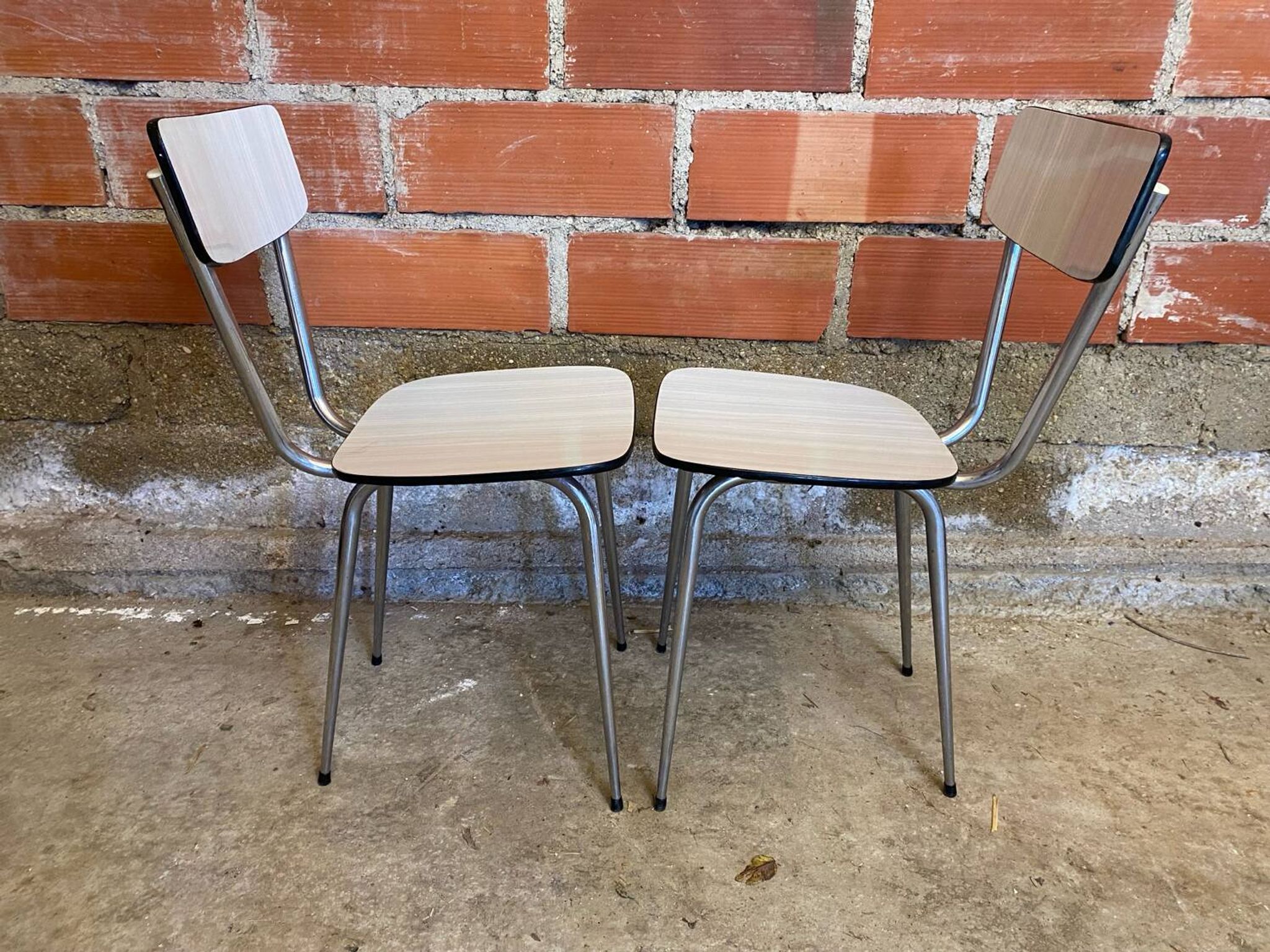 Pair of antique chrome metal chairs + white formica seat & back