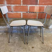 Pair of antique chrome metal chairs + white formica seat & back