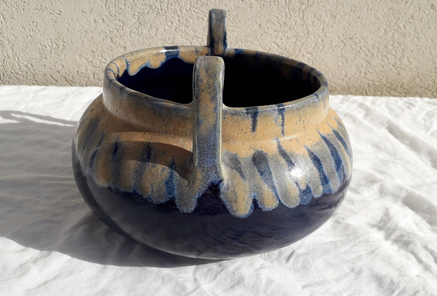 Signed stoneware pot cover